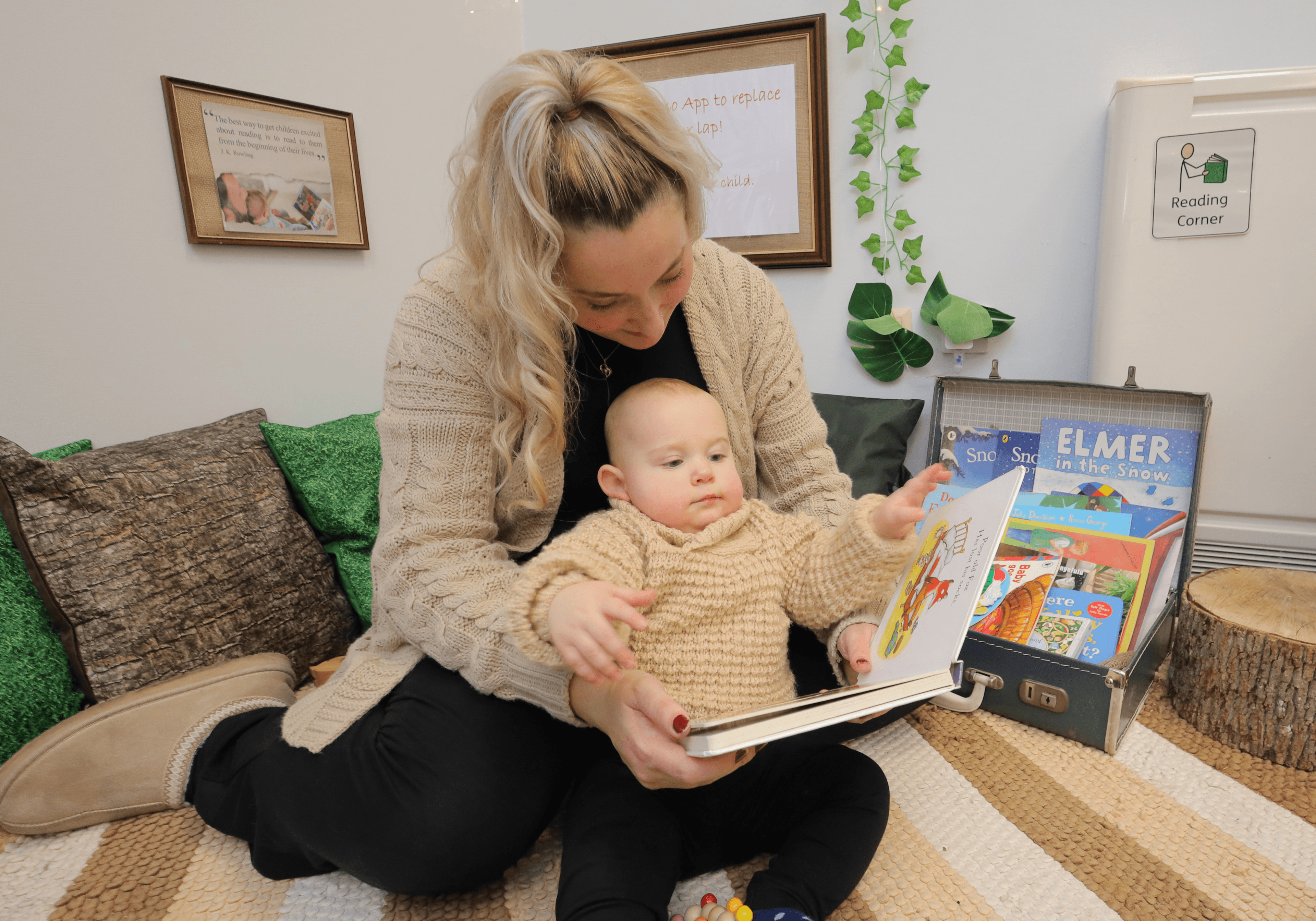 Mother and baby sharing a book