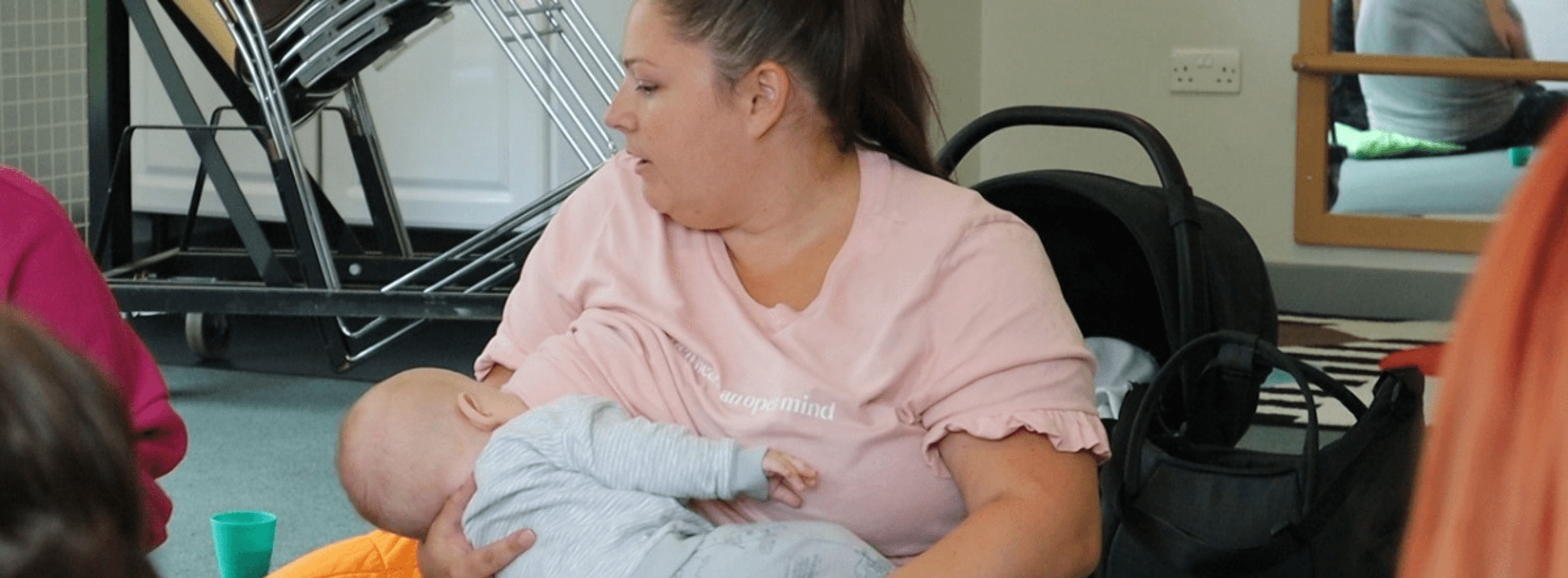 Mother breastfeeding baby