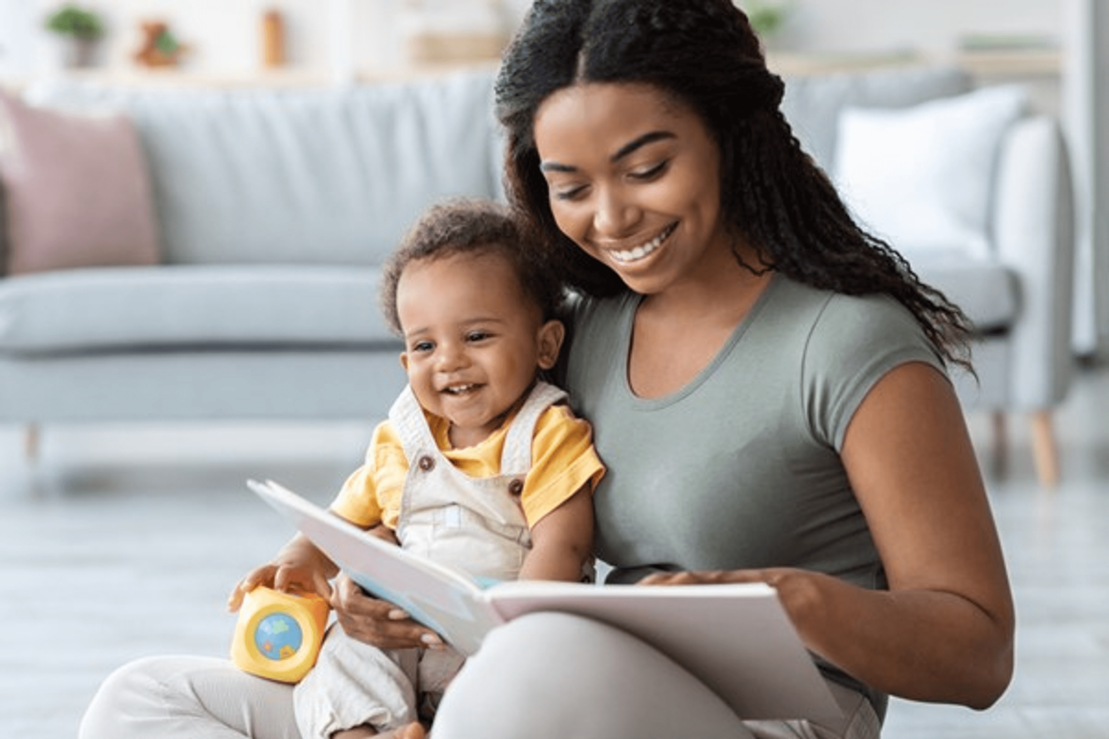 mother reading to baby